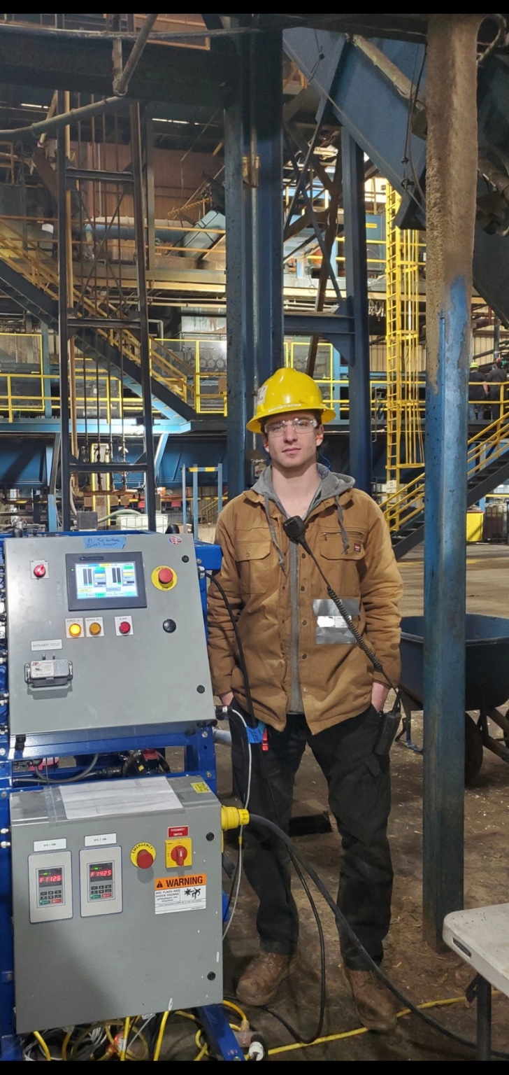 Tyler Rogalewicz with SCS process equipment at an industrial facility